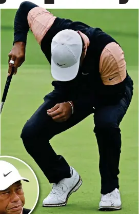  ?? EPA ?? Sore point: Woods is clearly in pain during his third-round 79 on Saturday