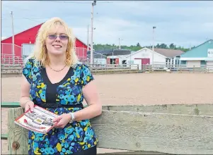  ?? TC MEDIA ?? Annapolis Valley Exhibition general manager Rachel Taylor stands by the main ring at the exhibition grounds in Lawrenceto­wn. She and her staff and 160 volunteers have a full week of events planned for Aug. 15 to 20 that includes fun, fun, and...