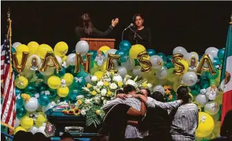  ?? Marie D. De Jesús / Staff file photo ?? Alma Garcia embraces Juan Cruz, the boyfriend of Army Spc. Vanessa Guillén, at her memorial service in August in Houston, months after investigat­ors say she was killed at Fort Hood.