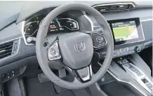  ??  ?? The interior of the Honda Clarity is simple, elegant and uncluttere­d.