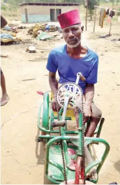  ??  ?? A crippled IDP at Daudu camp in Guma LGA