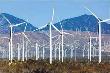  ?? Irfan Khan Los Angeles Times ?? WIND TURBINES in the Tehachapi Mountains are part of California’s plan for 100% clean energy by 2045.