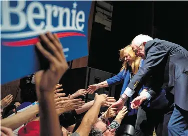  ?? Paul Ratje / AFP via Getty Images ?? Sen. Bernie Sanders and his wife, Jane, appear at a rally Saturday in El Paso. Sanders moved on to campaign in Texas, a Super Tuesday primary state, after his victory in the Nevada caucuses.