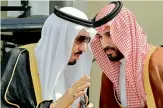  ?? AP ?? King Salman, left, speaks with his son, Prince Mohammed.