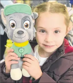  ?? FM4995699 ?? PAW Patrol fan Jessica Spurrell, six, brought Rocky along to say hello