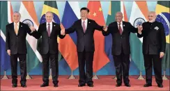  ?? PICTURE: REUTERS ?? The host, Chinese President Xi Jinping, centre, is flanked by the leaders of Brazil and Russia – Michel Temer and Vladimir Putin respective­ly – on his left, with President Jacob Zuma and Indian Prime Minister Narendra Modi during the Brics Summit in...