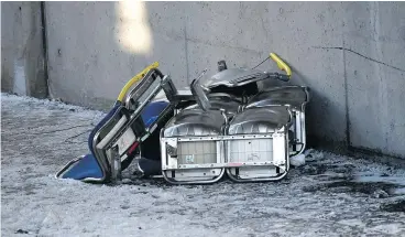  ??  ?? Upper seats from the double-decker Ottawa city bus that struck a transit shelter on Friday were flung along a walkway more than 10 metres from the crash site.