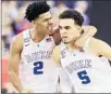  ?? Andy Lyons
Getty Images ?? DUKE’S Quinn Cook, left, and Tyus Jones celebrate a play.