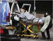  ?? CHRIS CARLSON — THE ASSOCIATED PRESS FILE ?? A patient is being evacuated from the Magnolia Rehabilita­tion and Nursing Center in Riverside on April 8.