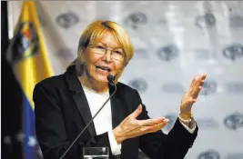  ?? Ariana Cubillos ?? The Associated Press Venezuelan chief prosecutor Luisa Ortega Diaz gives a press conference Tuesday in Caracas, Venezuela. The Venezuelan Supreme Court held a hearing Tuesday on whether to strip her of immunity from prosecutio­n for unspecifie­d...