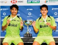  ?? BERRU ANGRIAWAN FOR JAWA POS ?? LEGA: Berry Angriawan/Hardianto meraih gelar Australia Open 2018 setelah di final mengalahka­n Wahyu Nayaka/Ade Yusuf.