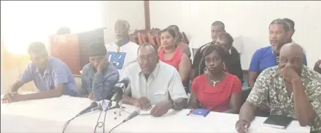  ??  ?? The ex-sugar workers at the GAWU press conference on Wednesday.