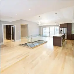  ?? Alex SCHULDT, THE HOLMES GROUP ?? Natural, light-coloured hardwood flooring is becoming more popular for smaller spaces, such as high-rise condos and small living areas.