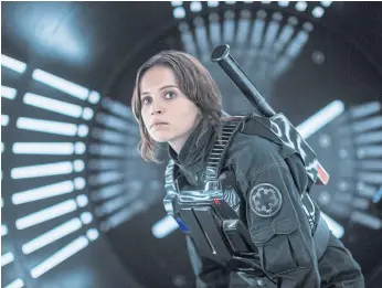  ??  ?? GENTLE TOUCH: Felicity Jones as Jyn Erso in a scene from ‘Rogue One: A Star Wars Story’. She is the second female character with a lead role in a ‘Star Wars’ movie in the past two years.