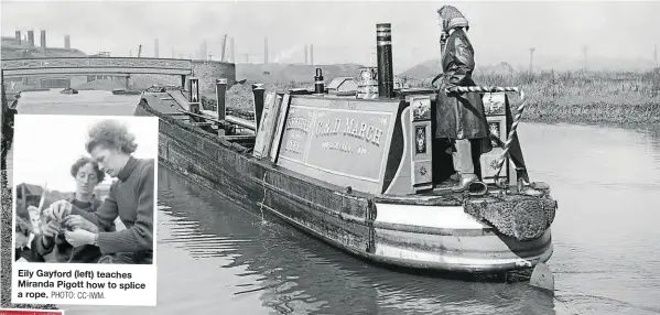  ?? PHOTO: CC-IWM. ?? Daphne March at the tiller of Heather Bell, heading along the canals of the industrial Midlands.