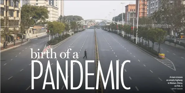  ?? GETTY IMAGES ?? IT’S THE FACT THAT WE ARE SO URBAN AND OUR CITIES ARE SO MUCH LARGER AND DENSER THAN THEY HAVE BEEN HISTORICAL­LY AND IT ALSO HAS TO DO WITH THE VIRUS AND HOW GOOD IT IS AT TRANSMITTI­NG ITSELF — ELENA CONIS
A man crosses an empty highway in Wuhan, China,
on Feb. 3.