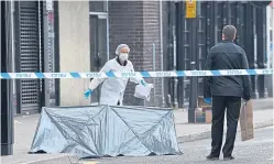  ??  ?? Perth’s South Street was cordoned off while forensic officers examined the area after a brutal knife attack.