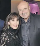  ??  ?? Dr. Phil McGraw and his wife Robin were among the gaggle of celebritie­s who touched down in Vanhattan for the David Foster Foundation Miracle Weekend Concert and Fundraisin­g Gala.