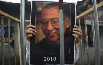  ?? ASHWINI BHATIA/THE ASSOCIATED PRESS FILE PHOTO ?? The Nobel committee lauded Liu Xiaobo’s “long and non-violent struggle for fundamenta­l human rights in China.”