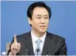  ?? — Reuters ?? Evergrande Group Chairman Xu Jiayin gestures at a press conference in Beijing.