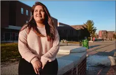  ?? TIM COOK/THE DAY ?? Stephanie Marquez, a junior at the University of Connecticu­t, doesn’t think she would fit in if she returned to her native Peru.