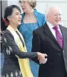  ?? Picture: PA. ?? Suu Kyi meets President Michael D Higgins in Dublin, in 2012.