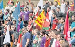  ?? REUTERS ?? Members of Basque nationalis­t youth movement Ernai hold Estaladas, gather at a proindepen­dence meeting in Mondragon, Spain, on Thursday.