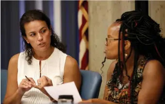  ?? NAncy lAnE / HErAld sTAff filE ?? SHIFTING FORTUNES: Councilors Annissa Essaibi-George, left, and Kim Janey, who’s now acting mayor, talk at an August 2019 hearing. Essaibi-George took in $244,516 for her mayoral bid during March.