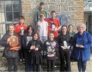  ?? ?? LEFT: The fifth and sixth class pupils from Tralee Educate Together pictured with teacher Deirdre Clifford and Principal Mary Brosnan after they were named as winners of the Concern Debate County Final this week.