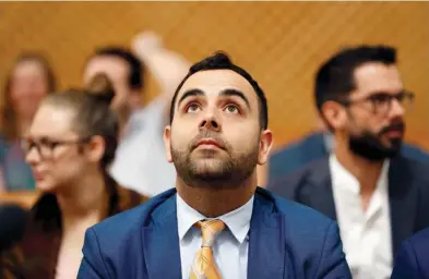  ?? (Ammar Awad/Reuters) ?? OMAR SHAKIR, Human Rights Watch Israel and Palestine director, looks up before a hearing at the Supreme Court in Jerusalem in September.