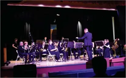  ?? RECORDER PHOTO BY JAMIE A. HUNT ?? The Portervill­e College Band directed by new adjunct Band Director David Green performs in concert on Thursday, November 17, at the PC Theater.