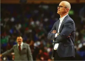  ?? Elsa / Getty Images ?? UConn coach Dan Hurley looks on against New Mexico State during the first half in the first round game of the NCAA Tournament on March 17 in Buffalo.