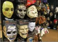  ?? PAUL POST -- PPOST@DIGITALFIR­STMEDIA.COM ?? There are more than 1,300 Spirit of Halloween stores in the U.S. including one in Wilton Mall, which has many costumes and masks to choose from.