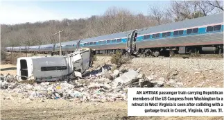  ??  ?? AN AMTRAK passenger train carrying Republican members of the US Congress from Washington to a retreat in West Virginia is seen after colliding with a garbage truck in Crozet, Virginia, US Jan. 31.