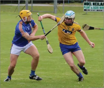  ??  ?? Wicklow’s Anto Byrne battles with Roscommon’s Micheál Byrne in Athleague last Saturday.