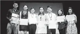  ??  ?? PLM mass communicat­ion students (from left) Marc Paul Dantes, Ashley Villegas, Andrea Alido, Issa Bautista, Justin Harvey Llamosa, Joanne San Pedro and Pam Lorilla receive grand champion award during 2013 Students Grand Prix Competitio­n.