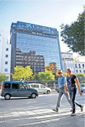  ?? JAIME REINA/AFP ?? El tercer banco español se muda a Valencia.