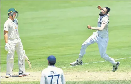  ?? REUTERS ?? Mohammed Siraj celebrates the wicket of Marnus Labuschagn­e during Day 4 of the final Test at the Gabba on Monday.