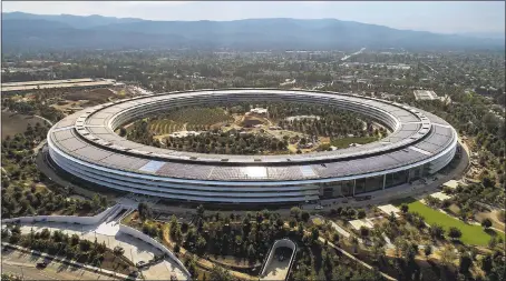  ?? LIPO CHING — STAFF ARCHIVES ?? The Apple Park campus in Cupertino is unique in its design and in the materials used, facts that helped drive the cost of the building.