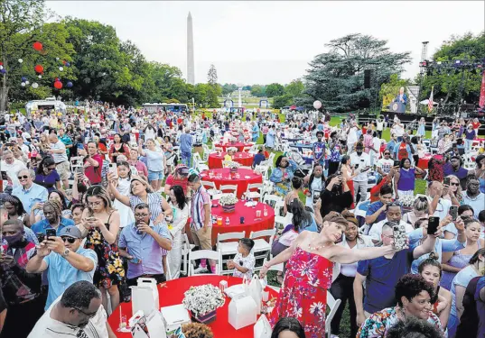  ?? Patrick Semansky The Associated Press ?? Service members and first responders were special guests at a July Fourth celebratio­n on the South Lawn of the White House.