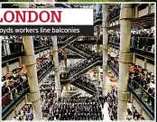  ?? ?? LONDON Lloyds workers line balconies