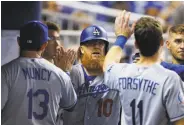  ?? Michael Reaves / Getty Images ?? Justin Turner had three hits and zero RBIs in his first two games back before breaking out Thursday.