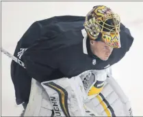  ?? CHARLES KRUPA - THE ASSOCIATED PRESS ?? Boston Bruins goaltender Tuukka Rask skates away from the crease with his mask up at the NHL hockey team’s camp on Tuesday, July 14, 2020, in Boston.