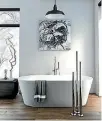  ?? MICO BATHROOMS ?? Floor-mounted towel rails save wall space.