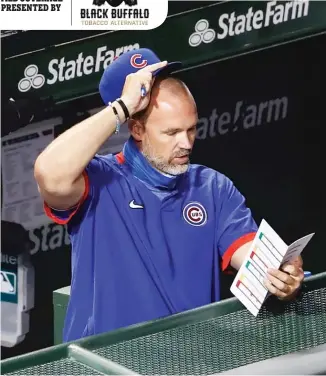  ?? MARK BROWN/ GETTY IMAGES (ROSS), KAMIL KRZACZYNSK­I/AP (MATTINGLY) ?? Cubs manager David Ross has been a steady hand for the team all season, but Marlins manager Don Mattingly has playoff experience as a skipper.