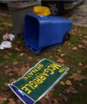  ?? PETE BANNAN – DIGITAL FIRST MEDIA ?? Republican campaign signs went out with the trash in Springfiel­d on the morning after a disastrous local election for the GOP in Delaware County.