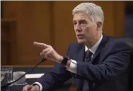  ?? SUSAN WALSH — THE ASSOCIATED PRESS FILE ?? Supreme Court Justice nominee Neil Gorsuch testifies on Capitol Hill in Washington before the Senate Judiciary Committee. Senate Democratic opposition to President Donald Trump’s Supreme Court nominee swelled Friday as Democrats neared the numbers...