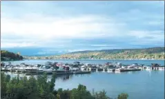  ?? ASSOCIATED PRESS ?? A view of boats on Keuka Lake in Red Jacket Park in the Finger Lakes region. The area is known for wineries and a scenic countrysid­e around 11 long, narrow lakes in central New York.