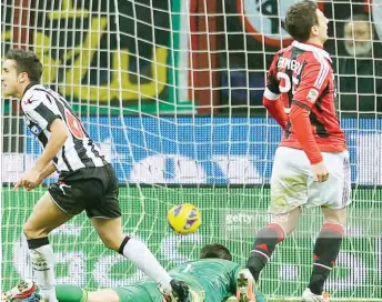  ??  ?? Udinese’s Gampiero Pinzi (L) celebrates scoring during the AC Milan vs Udinese Italian serie last term