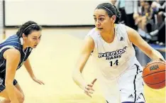  ?? SUPPLIED PHOTO ?? Niagara Falls native and A.N. Myer Secondary School graduate Nicole RigasDiDom­enico, right, drives the ball up the court for the Ryerson University women’s basketball team.